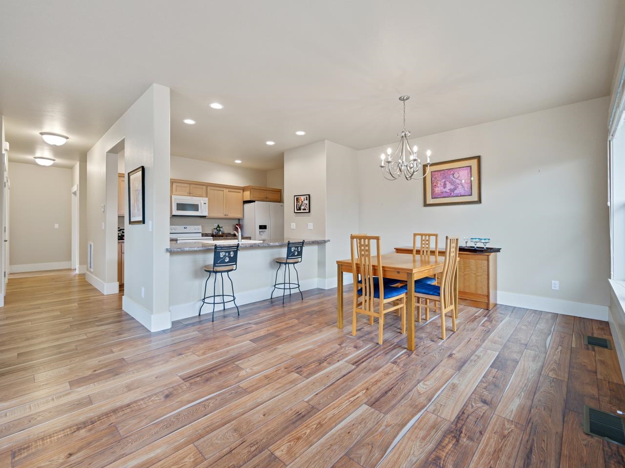 1245 Periwinkle Street Fruita, CO 81521 - Photo 8 of 34 a living room with furniture and kitchen view