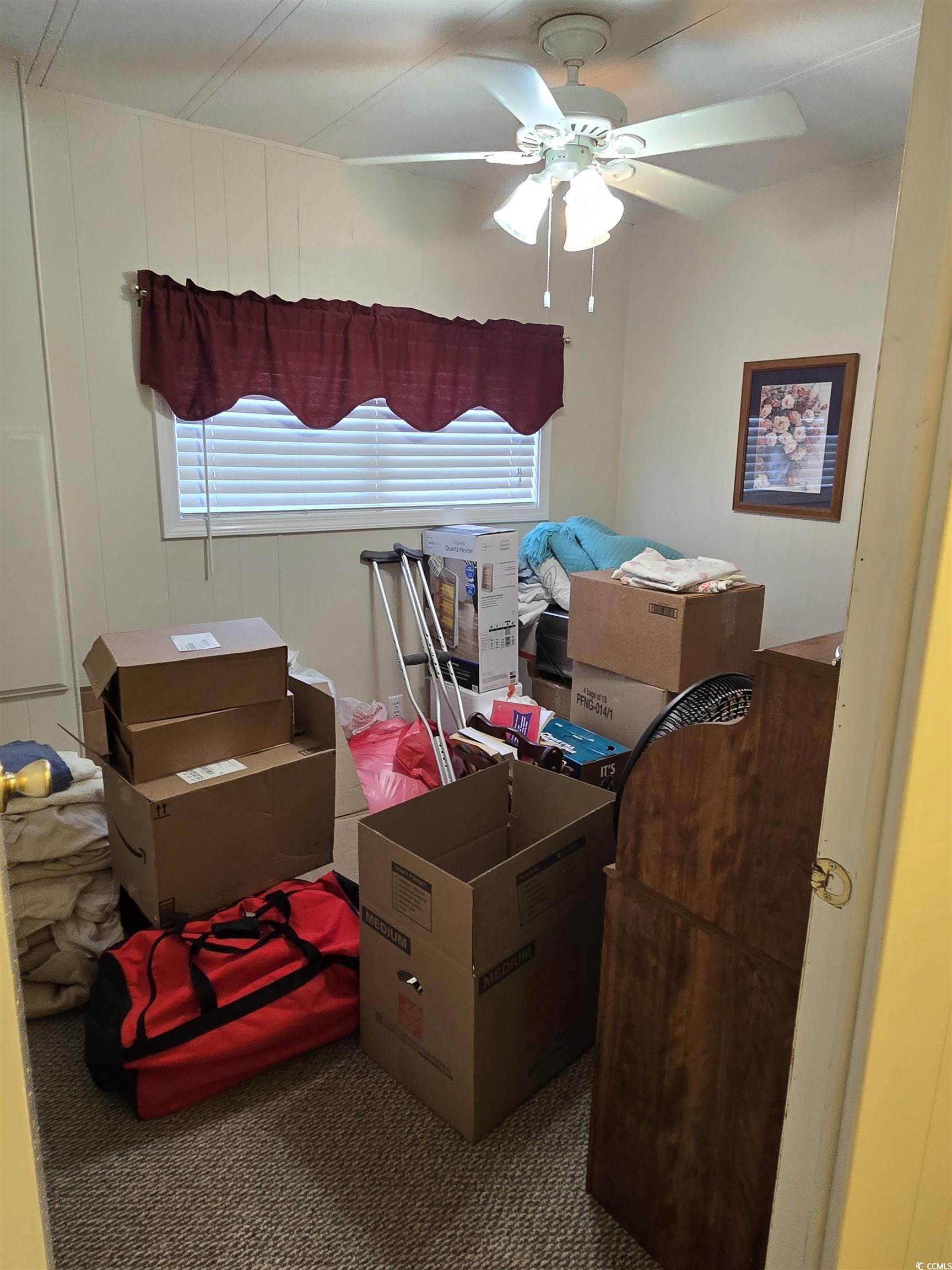 420 Delton Drive Murrells Inlet, SC 29576 - Photo 24 of 36 Carpeted bedroom featuring multiple windows and ceiling fan