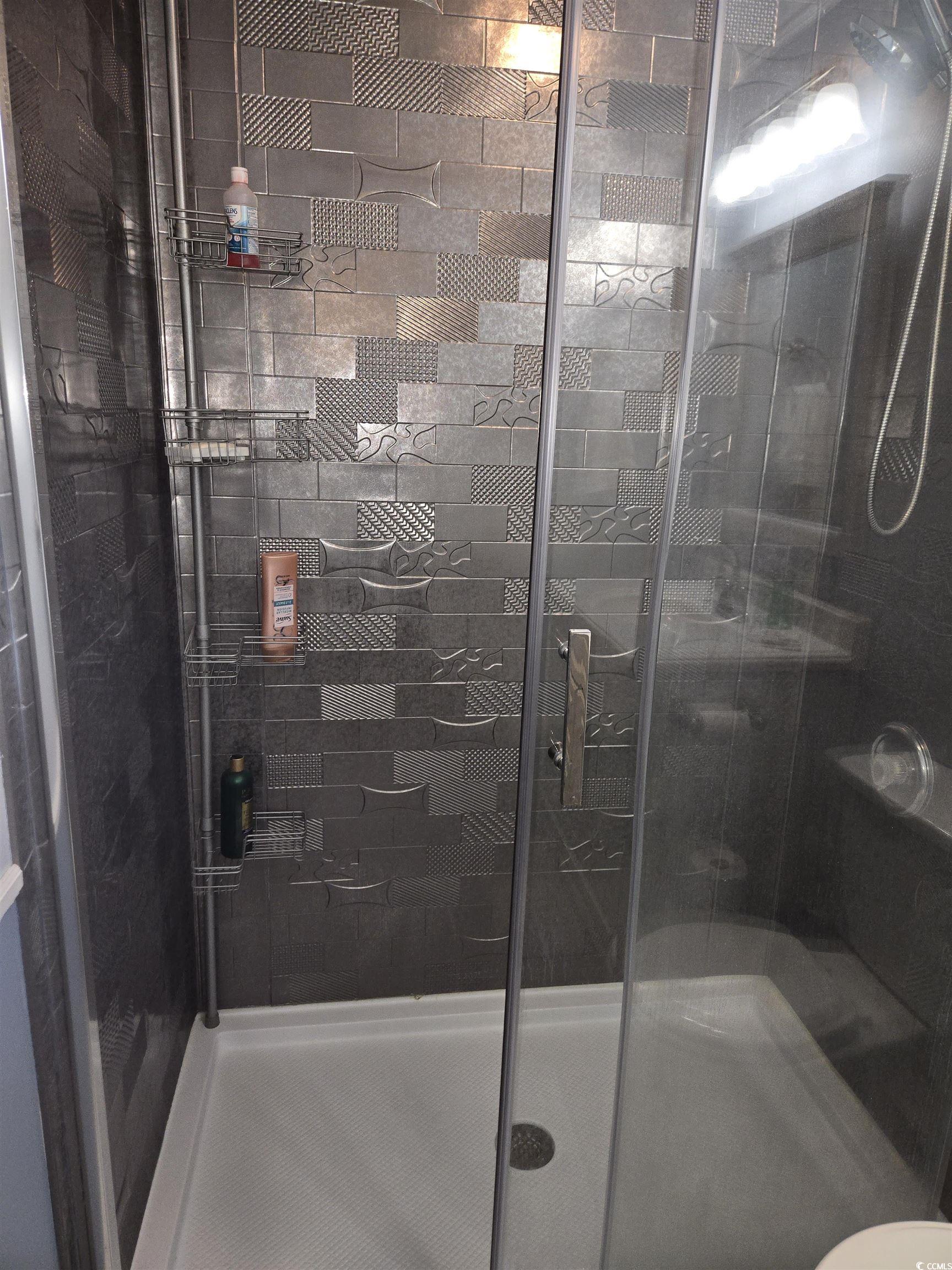 420 Delton Drive Murrells Inlet, SC 29576 - Photo 35 of 36 Bathroom featuring a shower stall