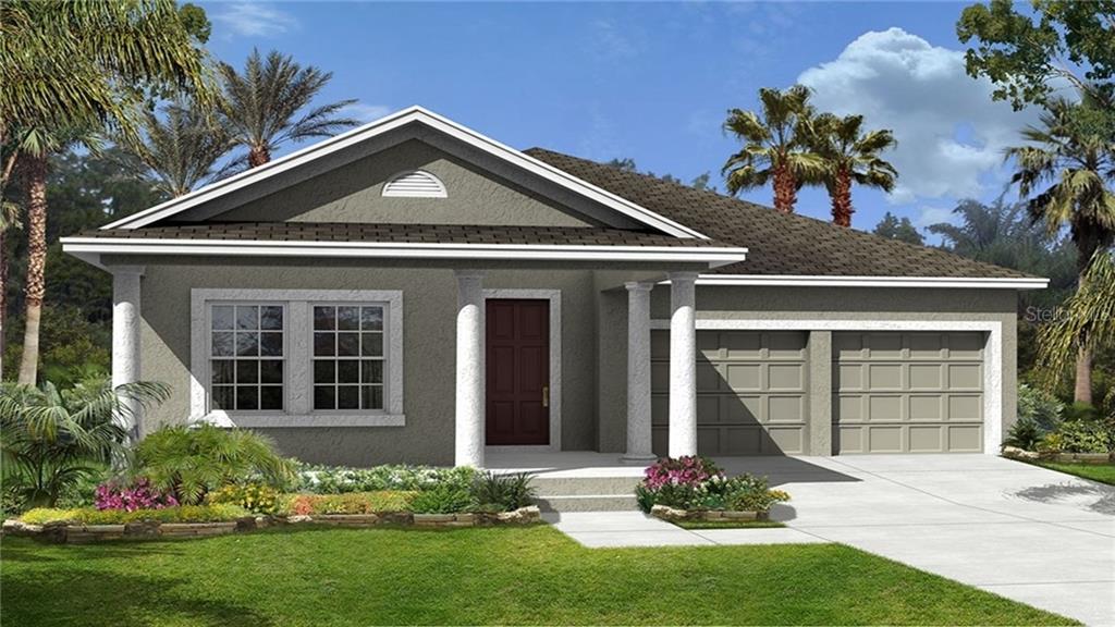 14621 Magnolia Ridge Loop Winter Garden, FL 34787 - Photo 1 of 1 a front view of a house with a yard