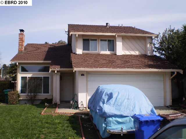 707 Sandy Brook Court Rodeo, CA 94572 - Photo 1 of 1 a front view of a house with garden