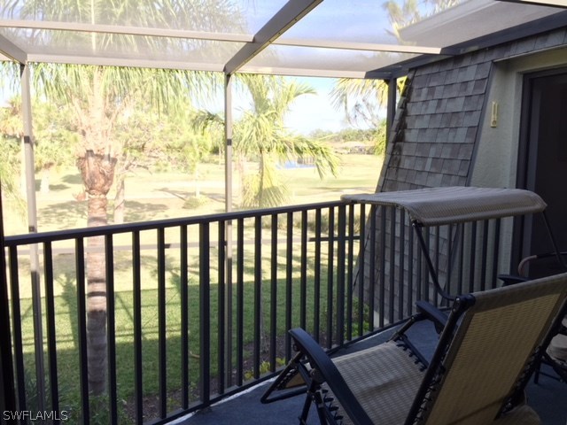 3021 Matecumbe Key Road, Unit 2 Punta Gorda, FL 33955 - Photo 17 of 24 a view of a balcony with furniture