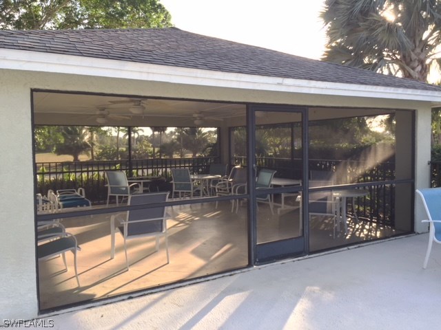3021 Matecumbe Key Road, Unit 2 Punta Gorda, FL 33955 - Photo 24 of 24 a view of a glass door with a outdoor space