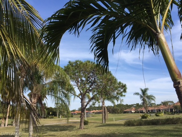 3021 Matecumbe Key Road, Unit 2 Punta Gorda, FL 33955 - Photo 6 of 24 a view of three palm trees