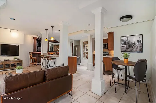 a kitchen with stainless steel appliances granite countertop a stove and a sink