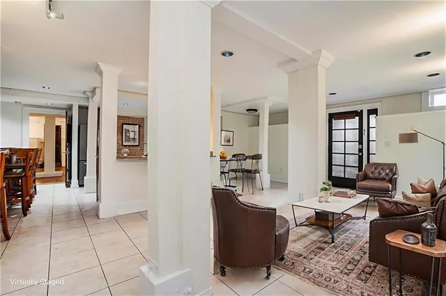a kitchen with a sink a stove and cabinets