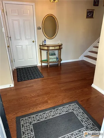 a living room with a rug