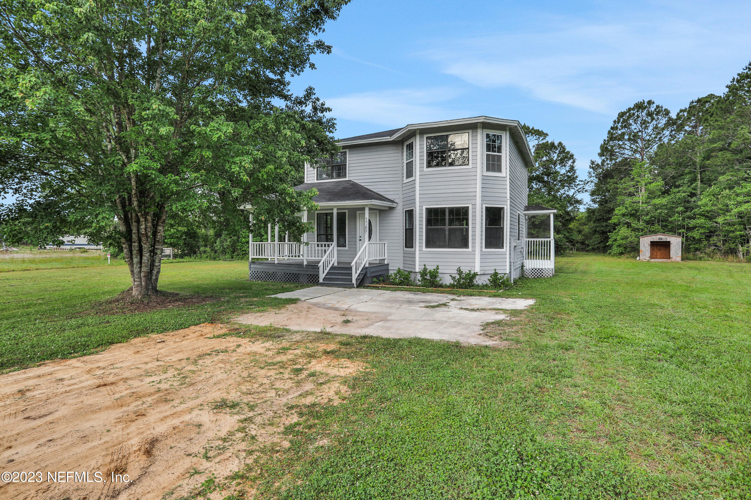 45195 Browns Farm Road Callahan, FL 32011 - Photo 2 of 24 a front view of house with yard and green space