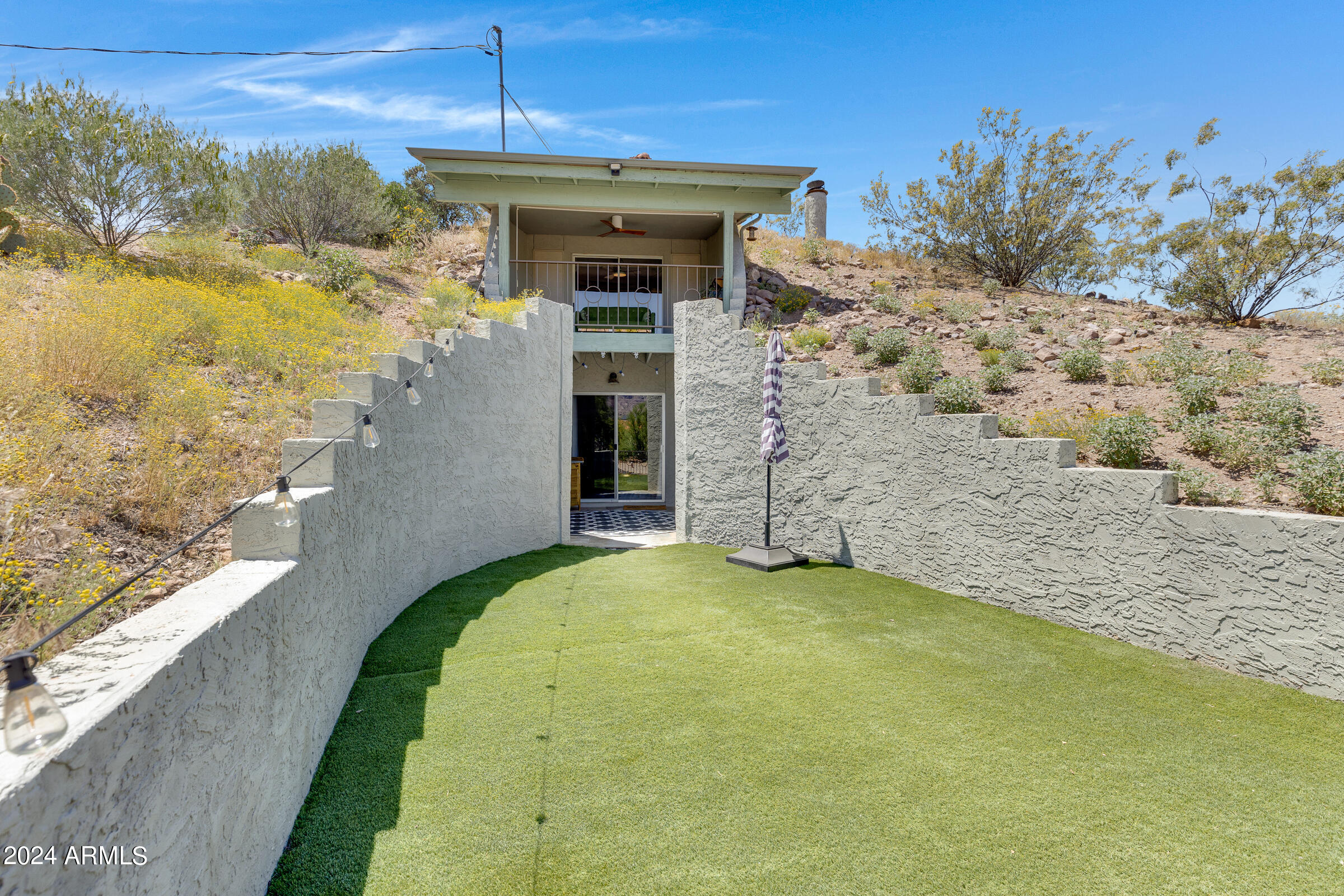 625 South Arroya Road Apache Junction, AZ 85119 - Photo 34 of 48 a view of a house with a yard