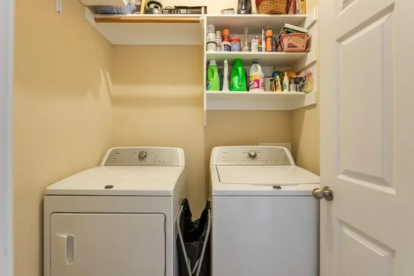 a utility room with dryer and washer