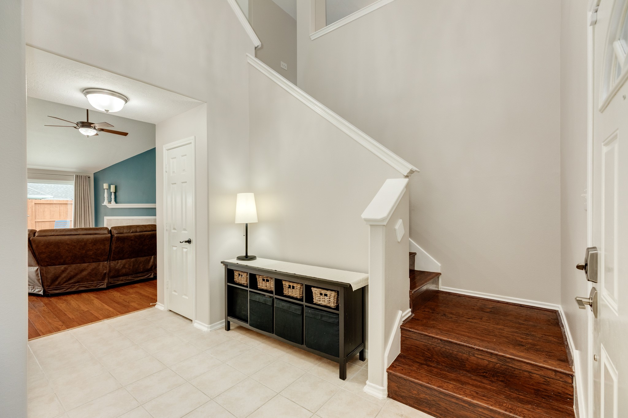 4113 Merlet Drive Pearland, TX 77584 - Photo 35 of 36 At the top of the stairs, the split floor plan features the two bedrooms and bathroom to the left, with a flex room on the right. Straight ahead is the family room.
