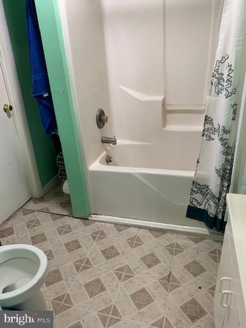 9409 Evans Road Berlin, MD 21811 - Photo 11 of 13 a bathroom with a sink and a bathtub