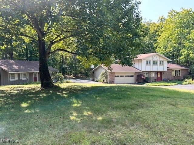3422 Southern Road Richfield, OH 44286 - Photo 1 of 42 Tri-level home with a front lawn and pole barn