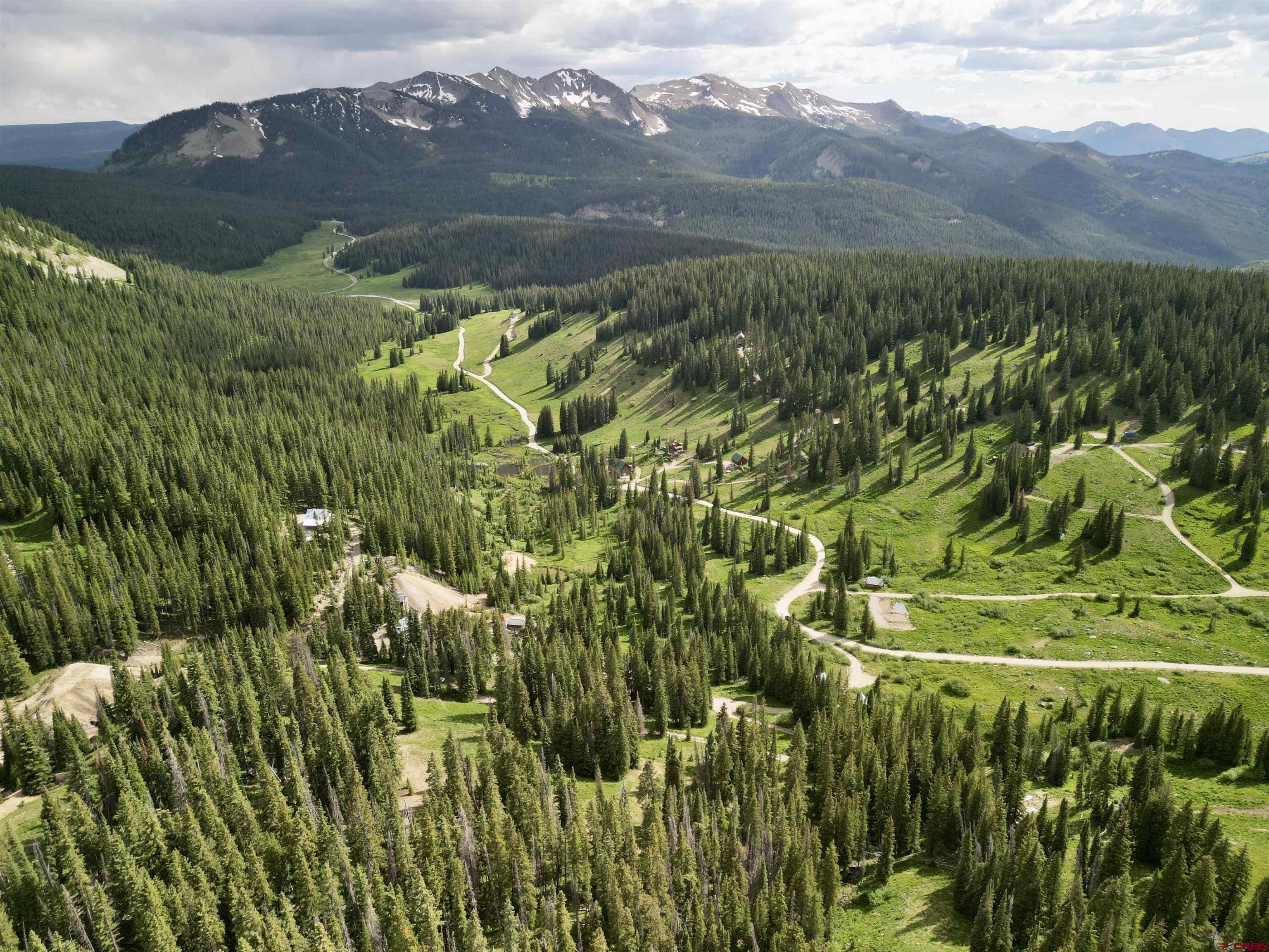 Tbd Tbd Copley Lake Road Crested Butte, CO 81224 - Photo 20 of 28 a view of a lush green hillside and a houses