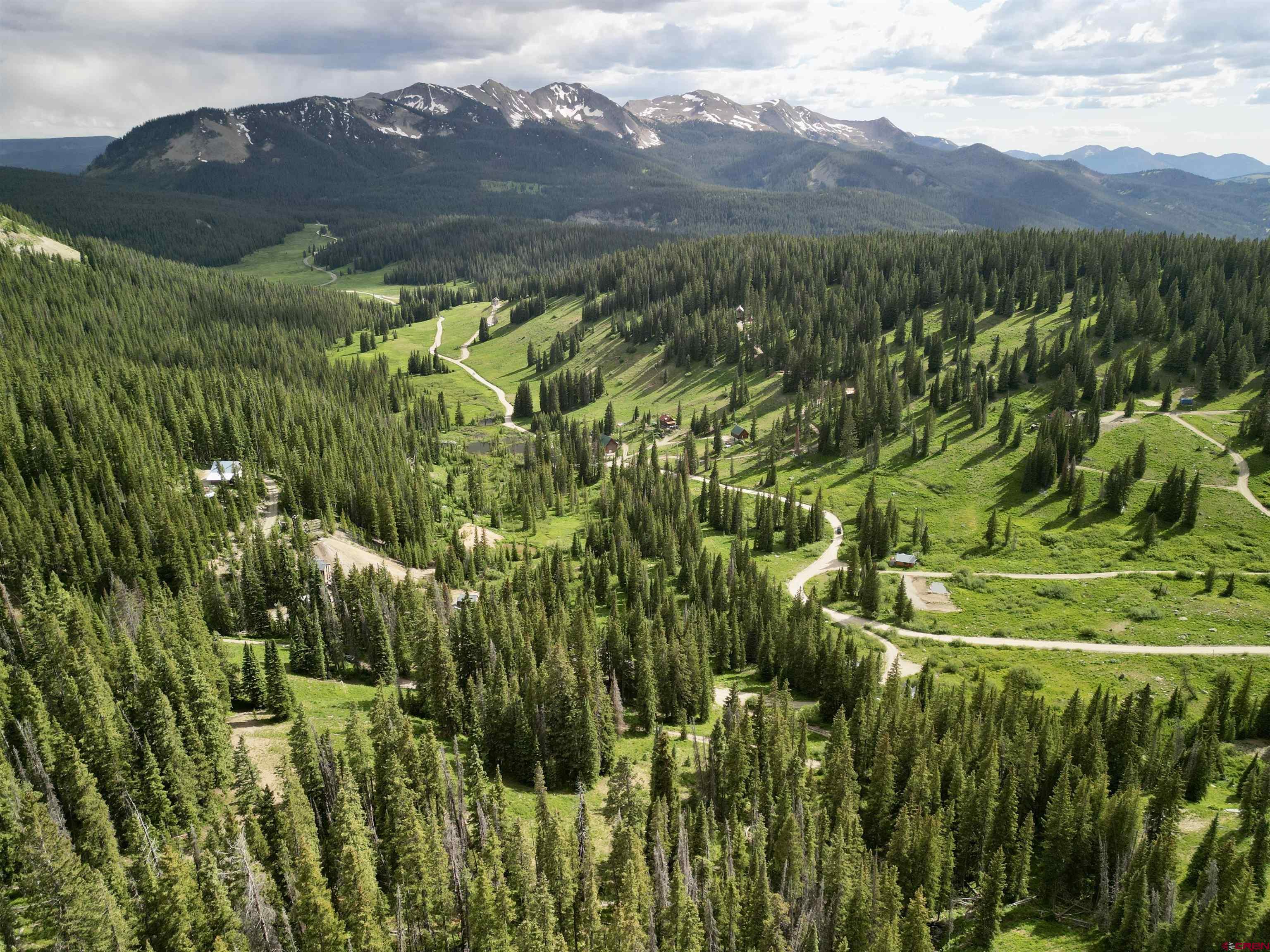 Tbd Tbd Copley Lake Road Crested Butte, CO 81224 - Photo 22 of 28 a view of a lush green hillside and a building