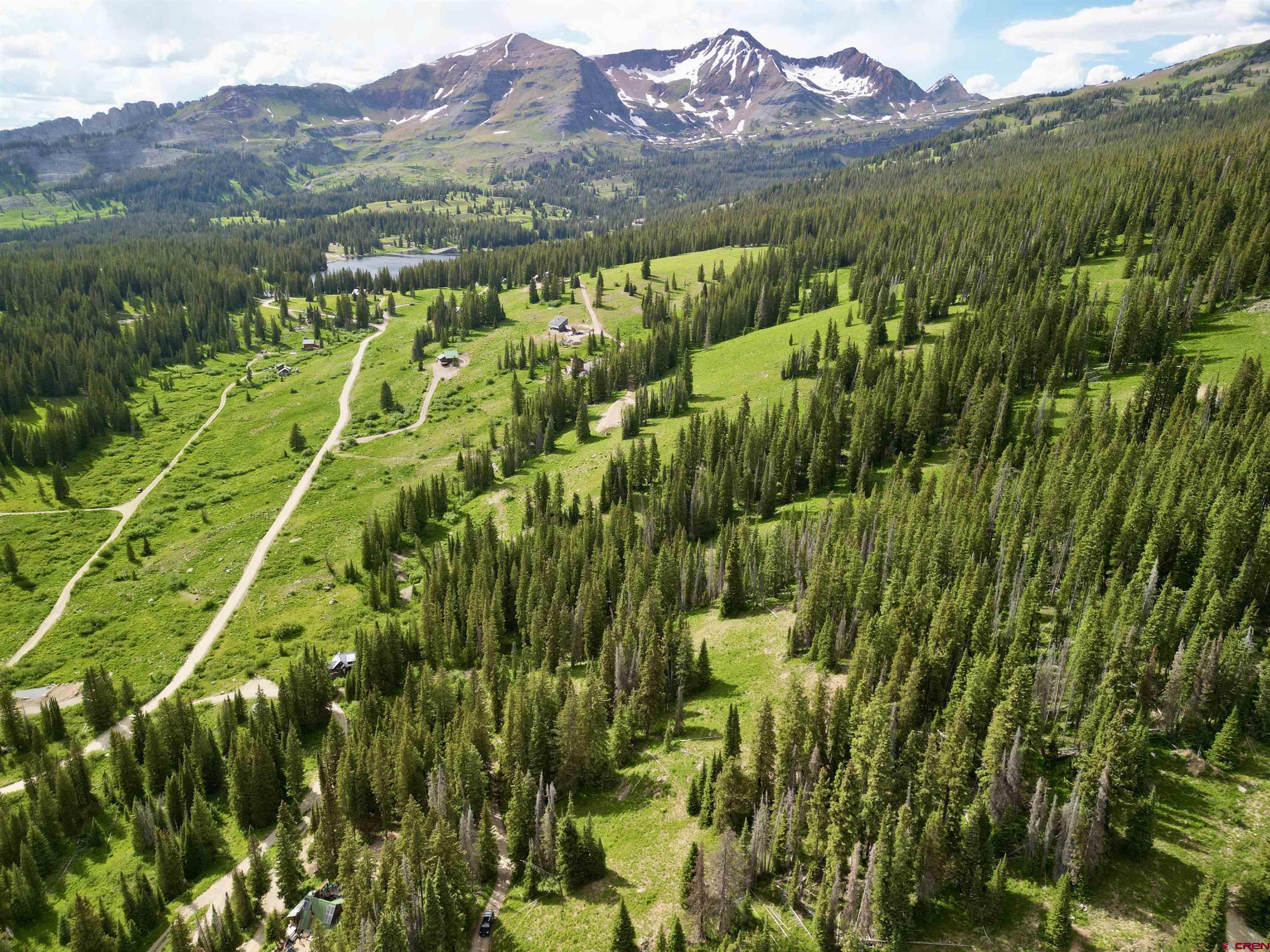 Tbd Tbd Copley Lake Road Crested Butte, CO 81224 - Photo 23 of 28 a view of a lush green forest with a lake