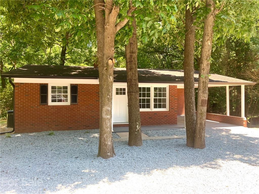 259 Roberta Road Concord, NC 28027 - Photo 12 of 12 a front view of a house with a porch