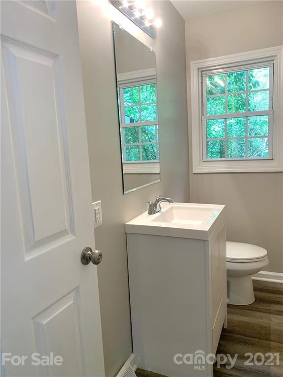 259 Roberta Road Concord, NC 28027 - Photo 9 of 12 a bathroom with a sink and a toilet