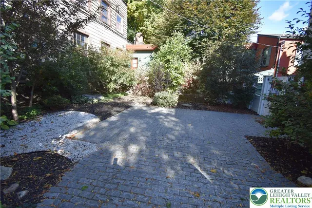 a view of backyard with green space