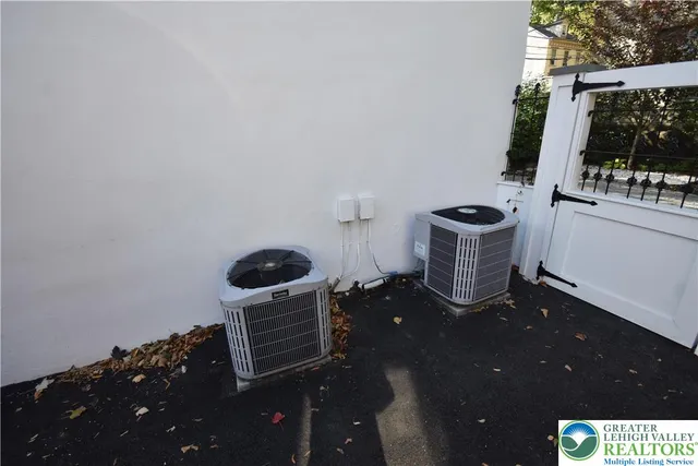 a kitchen with a sink and a stove next to a window