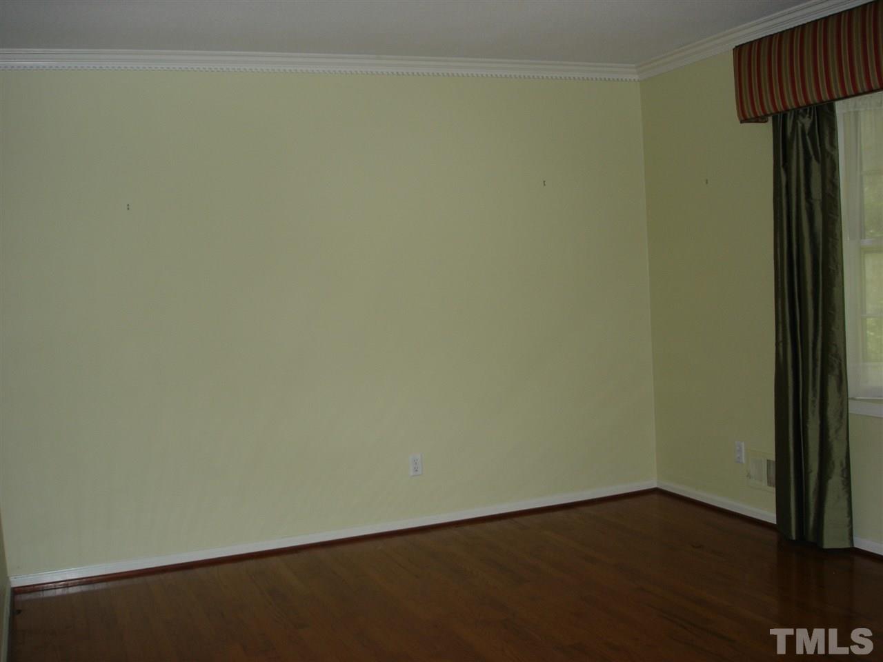 4516 Oak Park Road Raleigh, NC 27612 - Photo 2 of 17 a view of an empty room