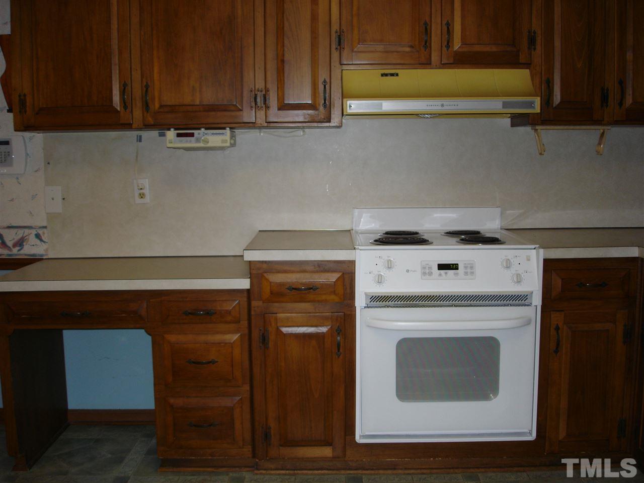 4516 Oak Park Road Raleigh, NC 27612 - Photo 8 of 17 a utility room with dryer and washer