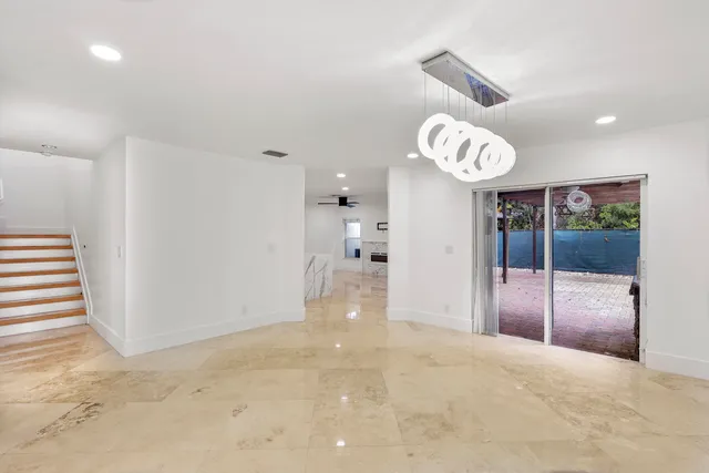 a view of a hallway with entryway