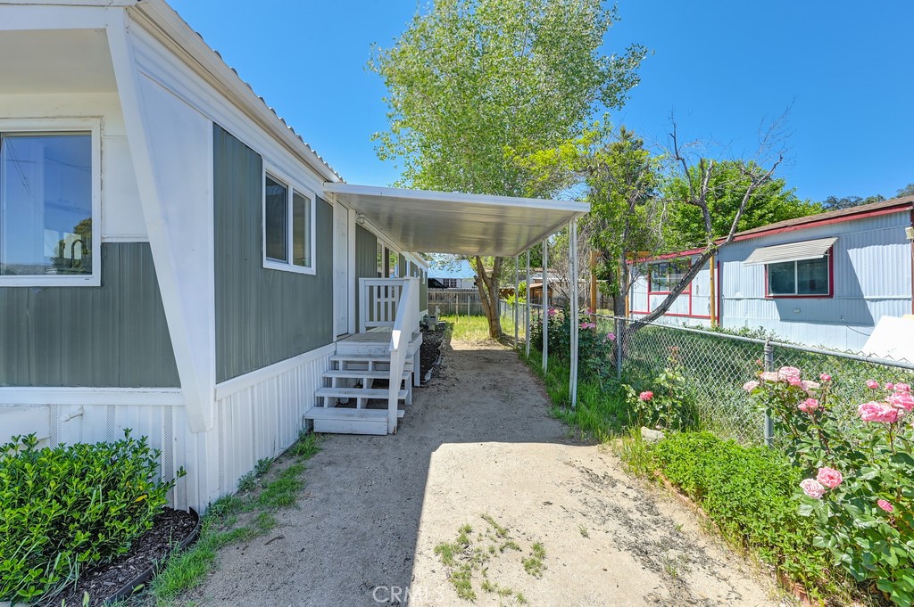 26455 Paradise Valley Road, Unit 86 Warner Springs, CA 92086 - Photo 7 of 34 a view of a house with backyard and sitting area