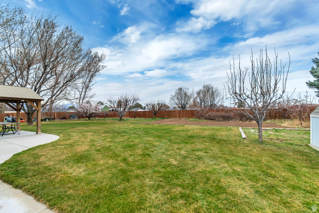 1697 North 500 West Mapleton, UT 84664 - Photo 35 of 50 Fenced backyard with a patio area