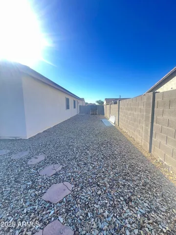 a view of a storage & utility room with a sink