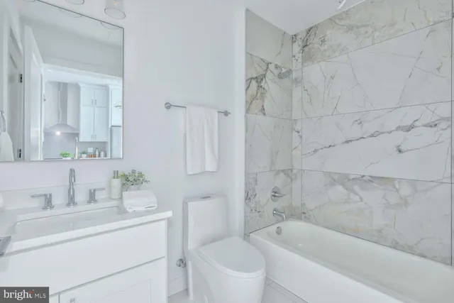 a bathroom with a sink and a bathtub