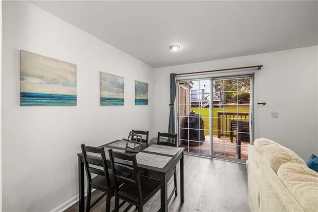 a view of a livingroom with furniture and window
