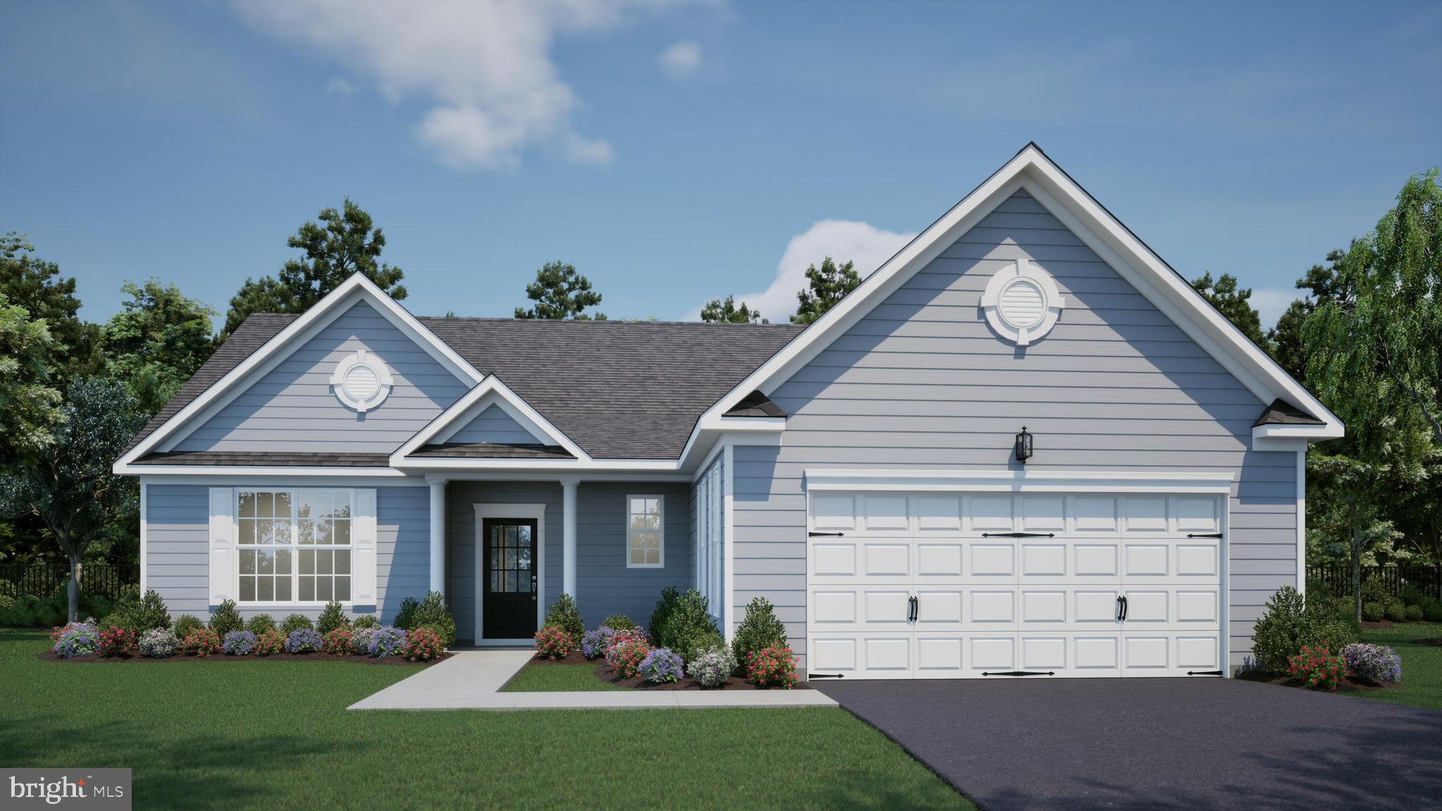 9 Antlered Way Georgetown, DE 19947 - Photo 2 of 3 a front view of a house with a yard