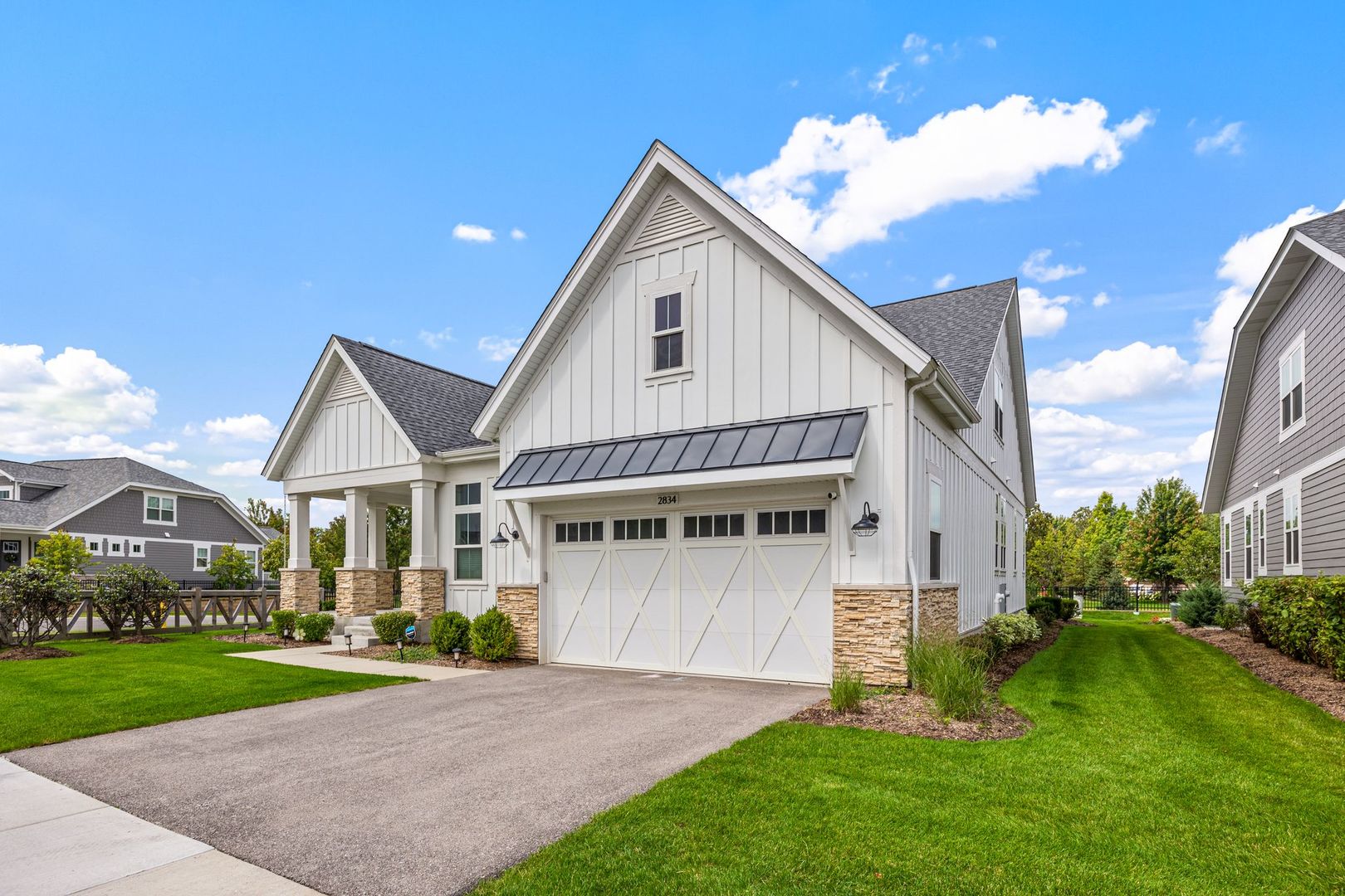 2834 Parkside Circle Glenview, IL 60026 - Photo 2 of 59 a front view of a house with a yard and garage
