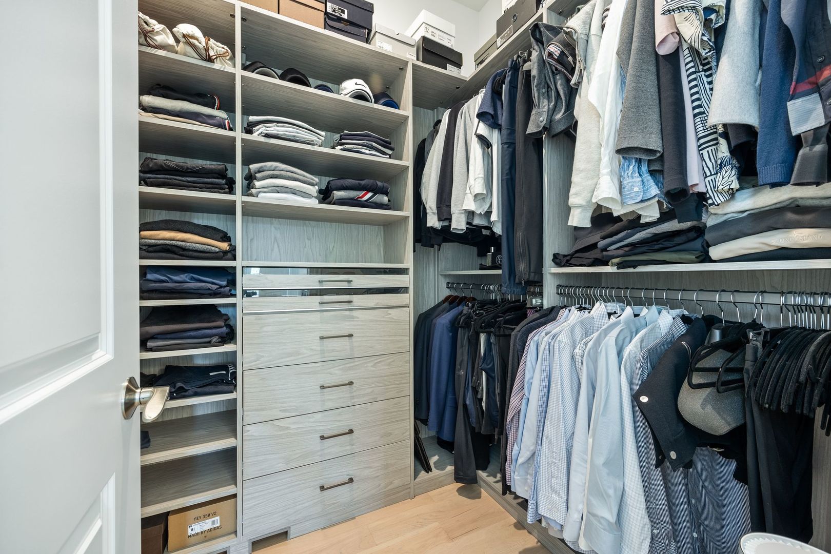 2834 Parkside Circle Glenview, IL 60026 - Photo 31 of 59 a view of walk in closet with clothes and shoes