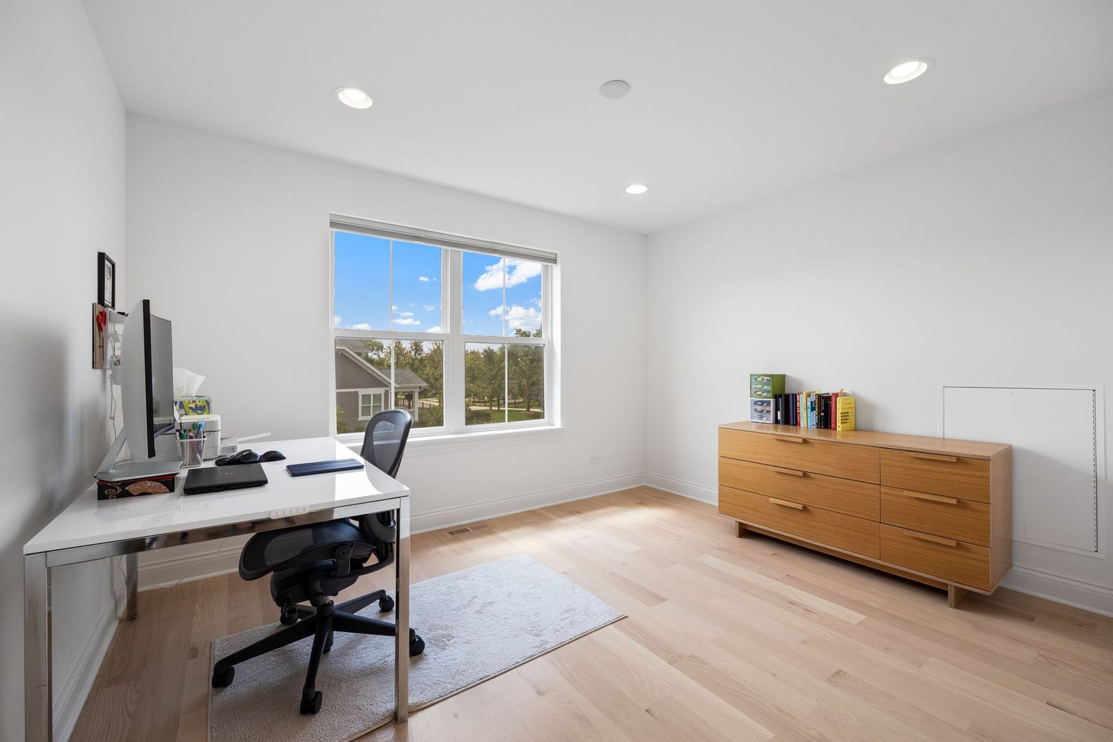 2834 Parkside Circle Glenview, IL 60026 - Photo 38 of 59 a view of a workspace with furniture and a window