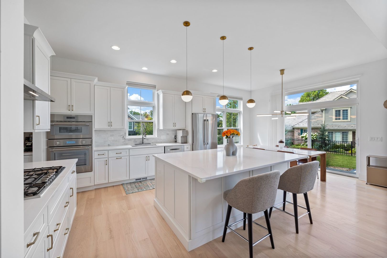 2834 Parkside Circle Glenview, IL 60026 - Photo 10 of 59 a large kitchen with a table and chairs in it