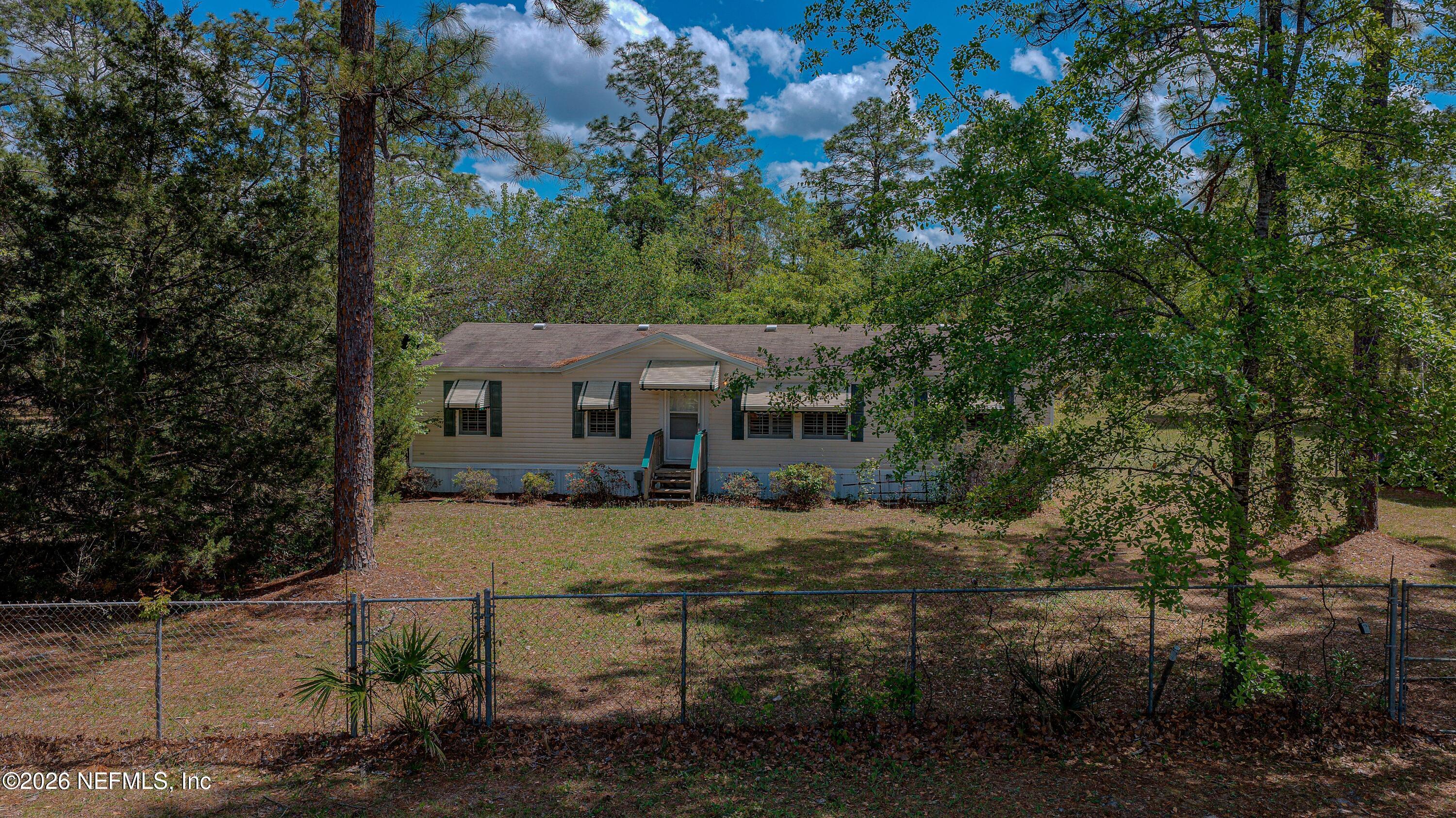 28050 Roundup Place Hilliard, FL 32046 - Photo 2 of 43 20260402-28050_Roundup_Pl-3