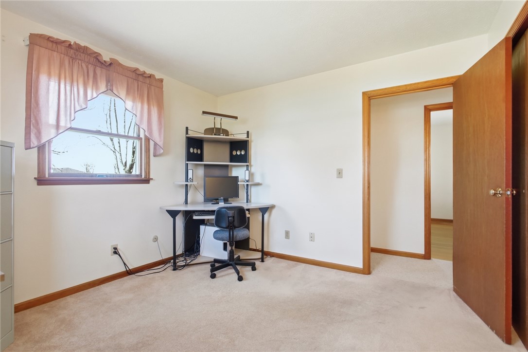 6718 Old Columbus Road South Vienna, OH 45369 - Photo 22 of 33 This spacious bedroom offers ample natural light and a neutral palette, ideal for personalization.