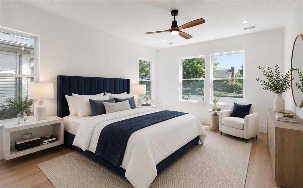 4927 Linnet Lane Dallas, TX 75209 - Photo 9 of 17 a bedroom with bed couch and window