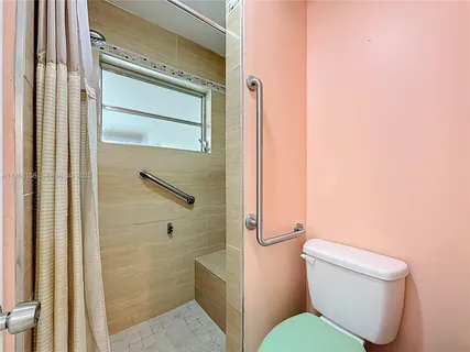 a bathroom with a sink vanity and a mirror