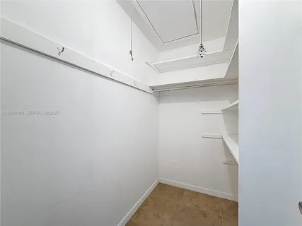 a view of staircase with a rug