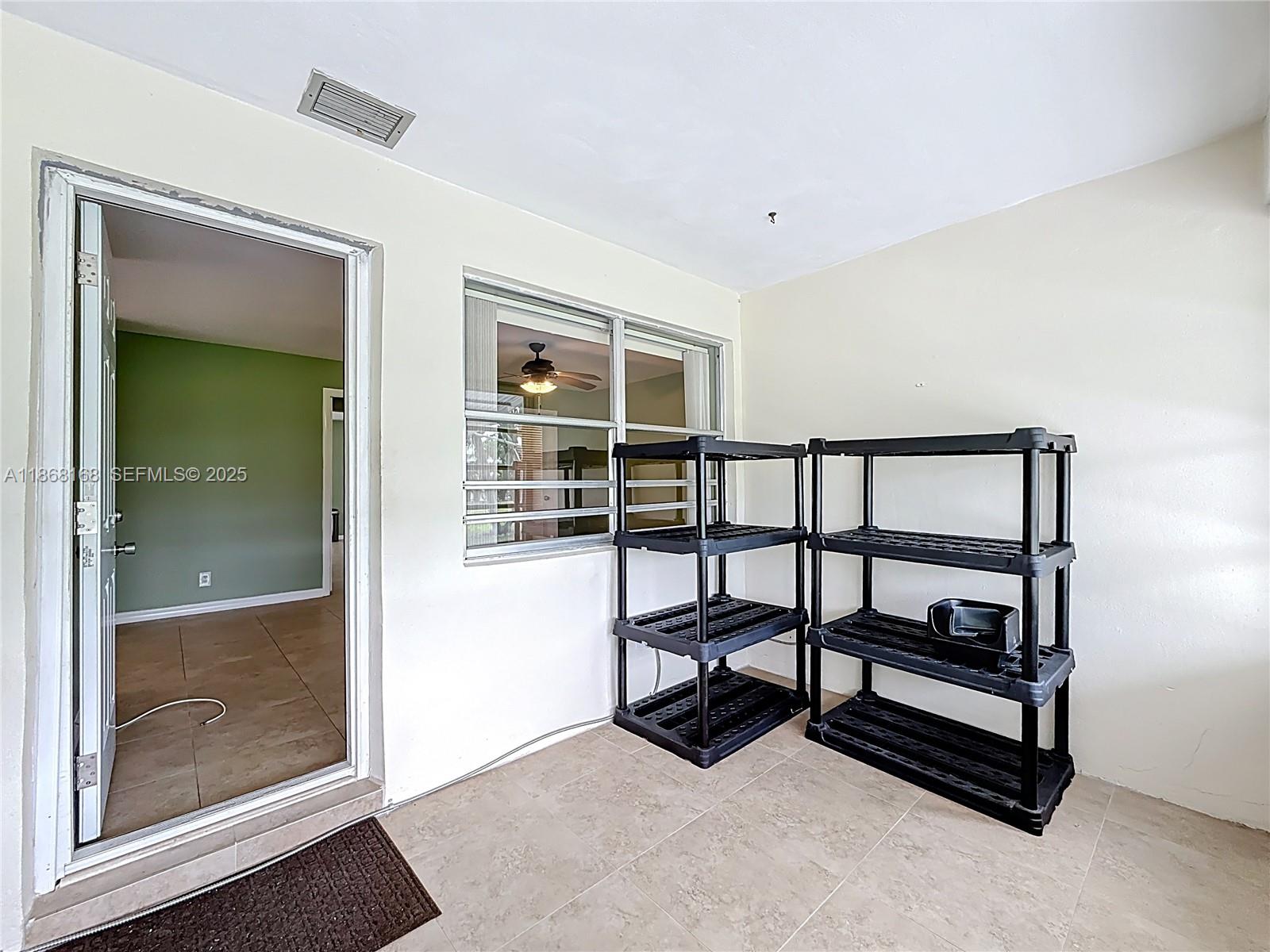 290 Main Boulevard, Unit C Boynton Beach, FL 33435 - Photo 37 of 56 a view of staircase with a rug