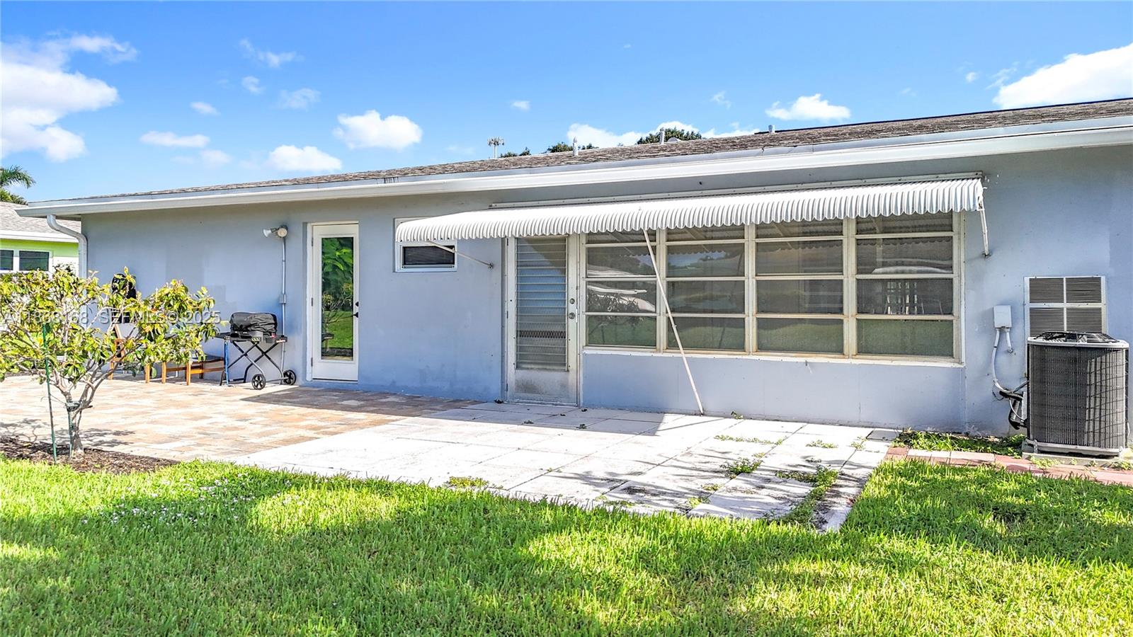 290 Main Boulevard, Unit C Boynton Beach, FL 33435 - Photo 45 of 56 a view of a house with a yard and plants