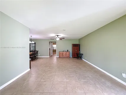 a view of a livingroom and a fireplace