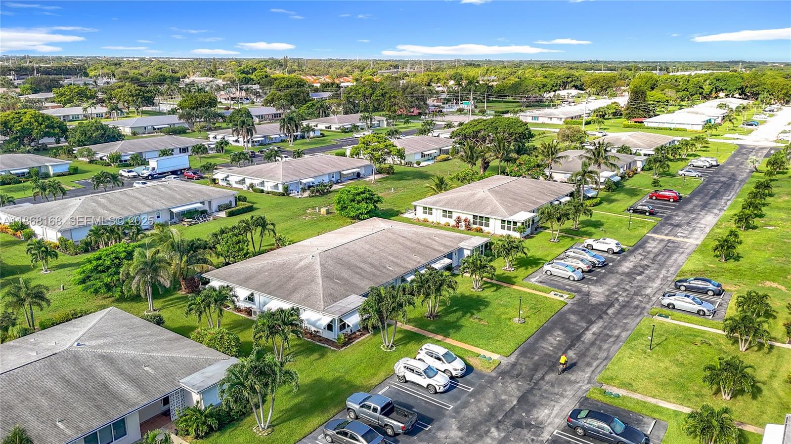 290 Main Boulevard, Unit C Boynton Beach, FL 33435 - Photo 55 of 56 an aerial view of residential houses with outdoor space