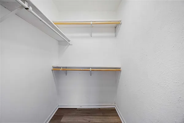 a view of a room with racks on the wall