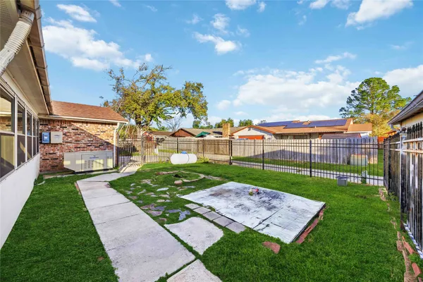 a view of a backyard with a garden