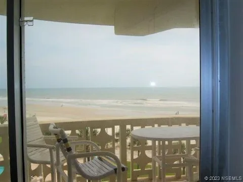 a view of ocean from a window