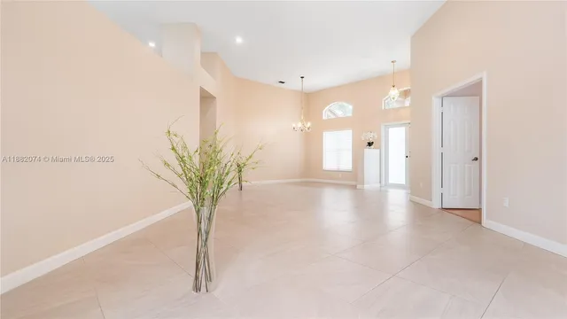 a view of a room with a potted plant